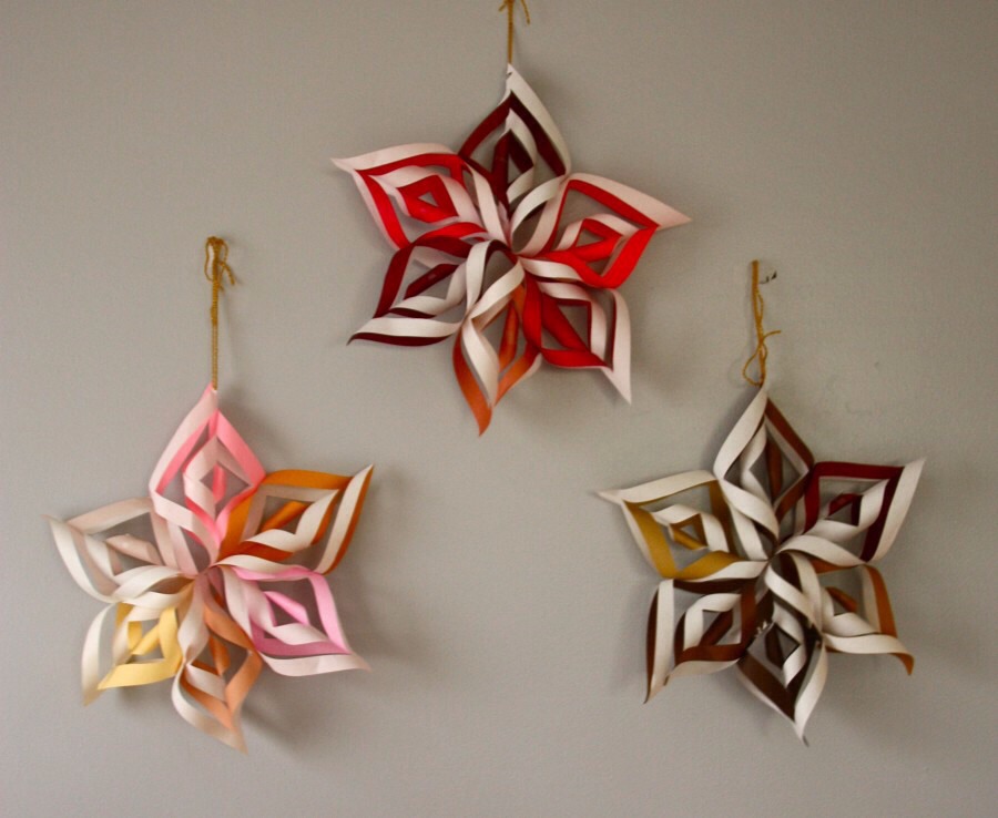 recycle paper by making easy snow flakes for christmas recycle paper by making easy snow flakes for christmas