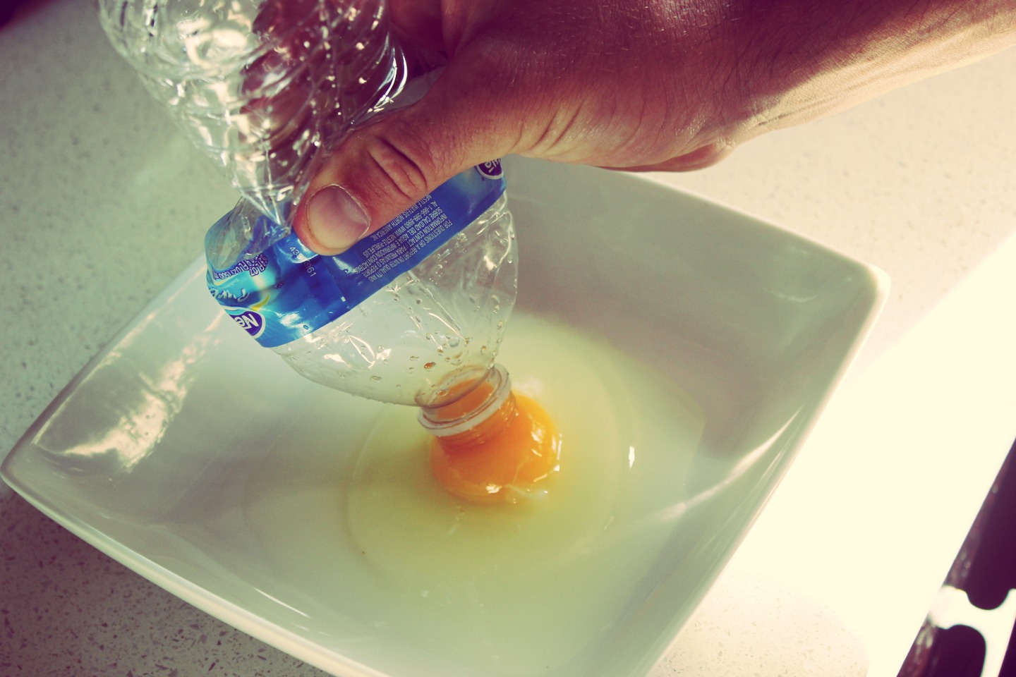 Egg-Sucked-into-Bottle ... , the yolk gets sucked into the bottle leaving the egg whites behind