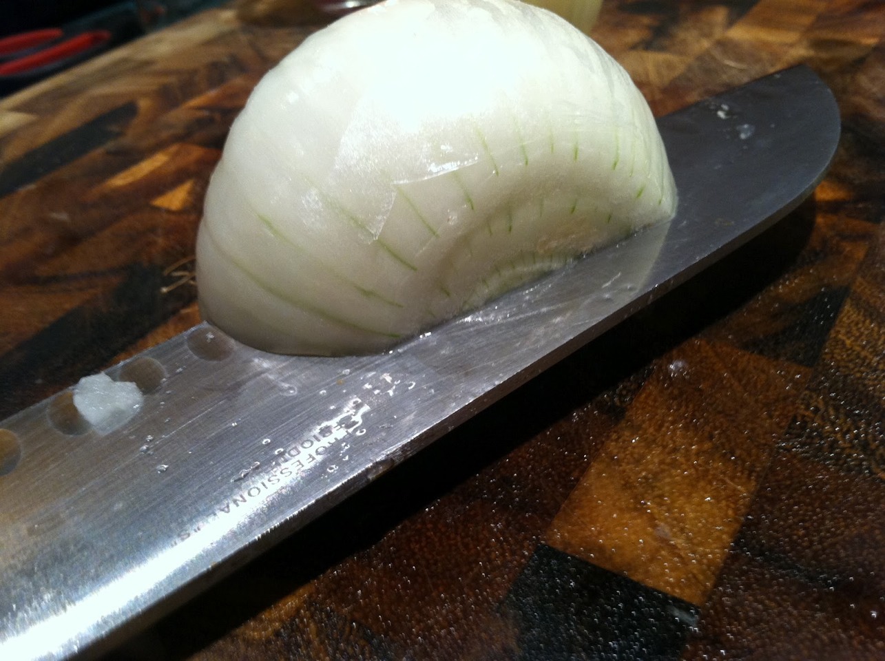 Biting On A Wooden Spoon While Cuting Onions Will Prevent Your Eyes